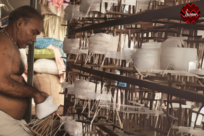 ikatan workers working on the ikat saree
