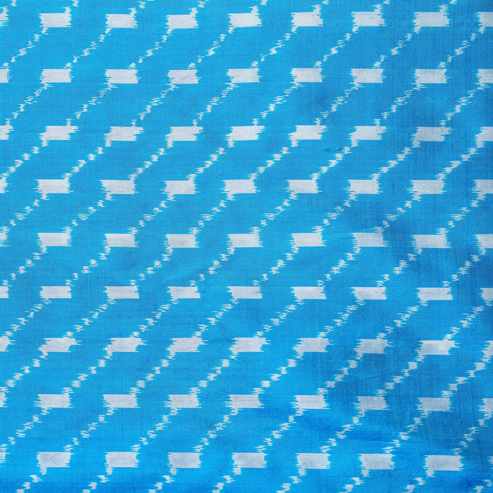 Ikatan Ice Blue & White Mulberry Silk Ikat Saree Ikatan