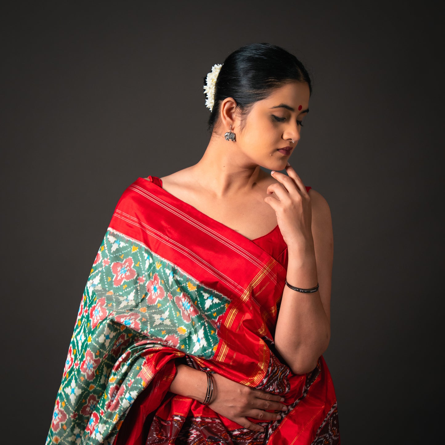 Ikatan Green & Red Mulberry Silk Patola Ikat Saree Ikatan