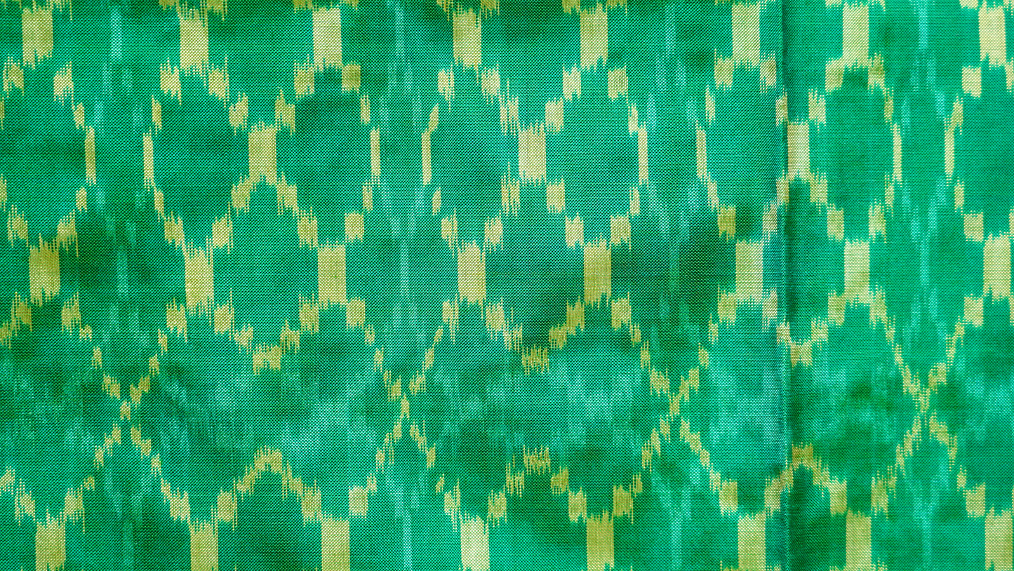 Turquoise Green & Magenta Mulberry Silk Pochampally Ikat Saree