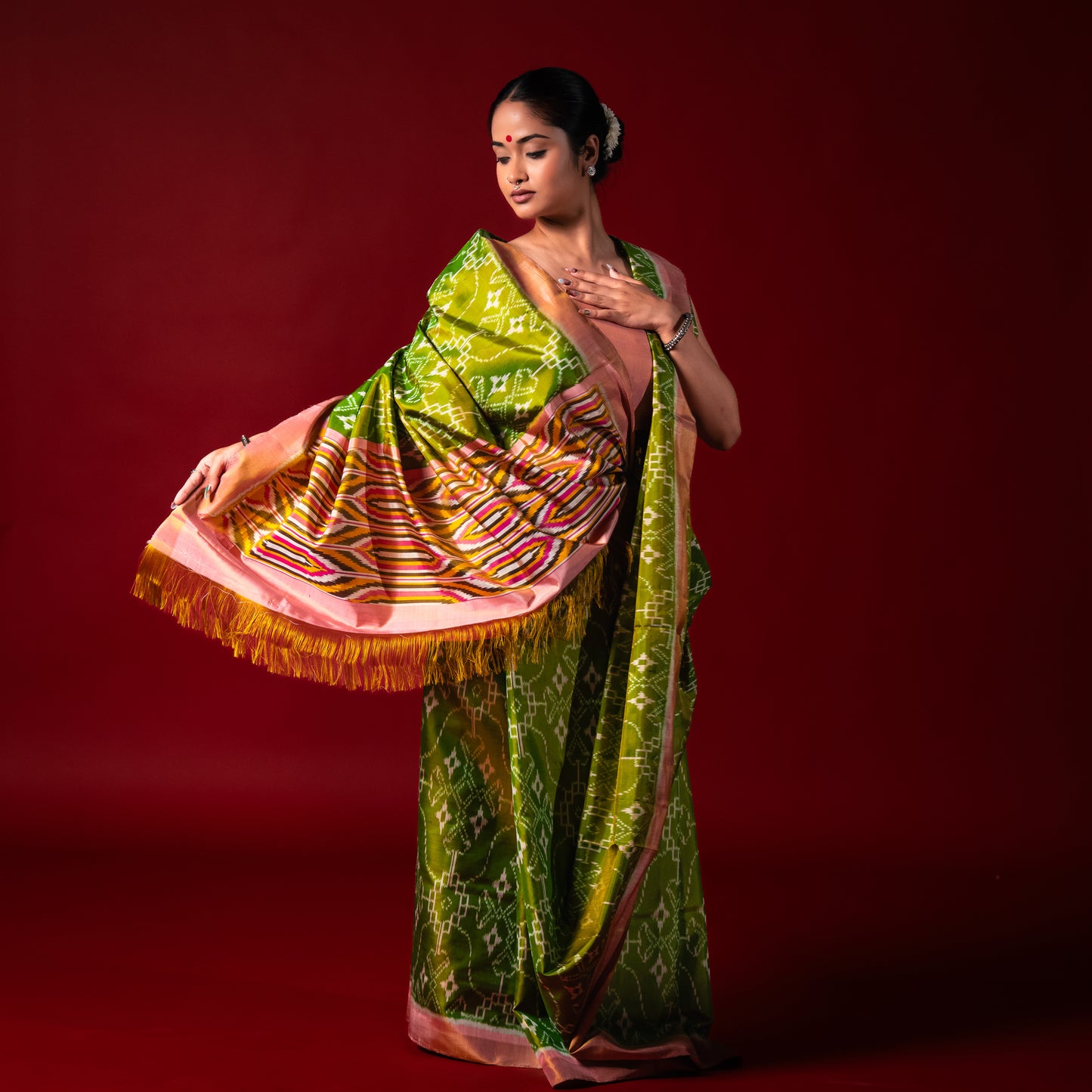 Ikatan Parrot Green & Peach Mulberry Silk Patola Ikat Saree Ikatan