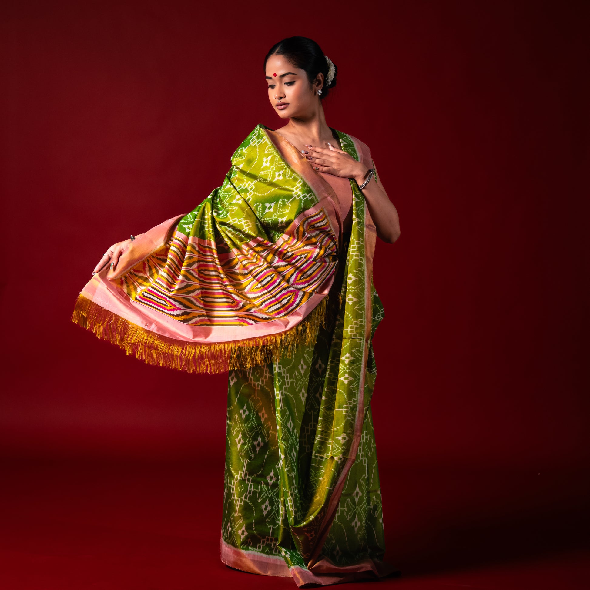 Ikatan Parrot Green & Peach Mulberry Silk Patola Ikat Saree Ikatan