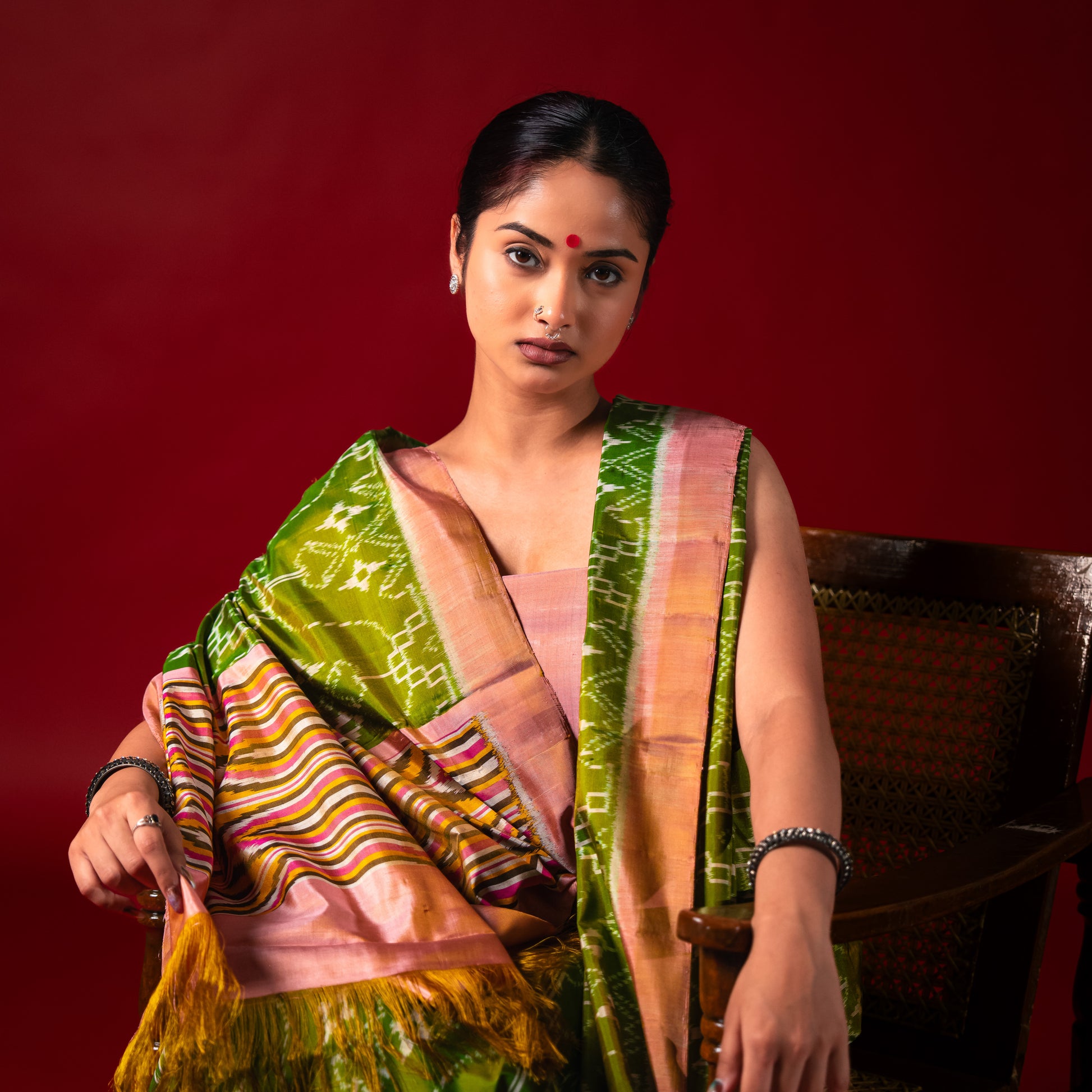 Ikatan Parrot Green & Peach Mulberry Silk Patola Ikat Saree Ikatan