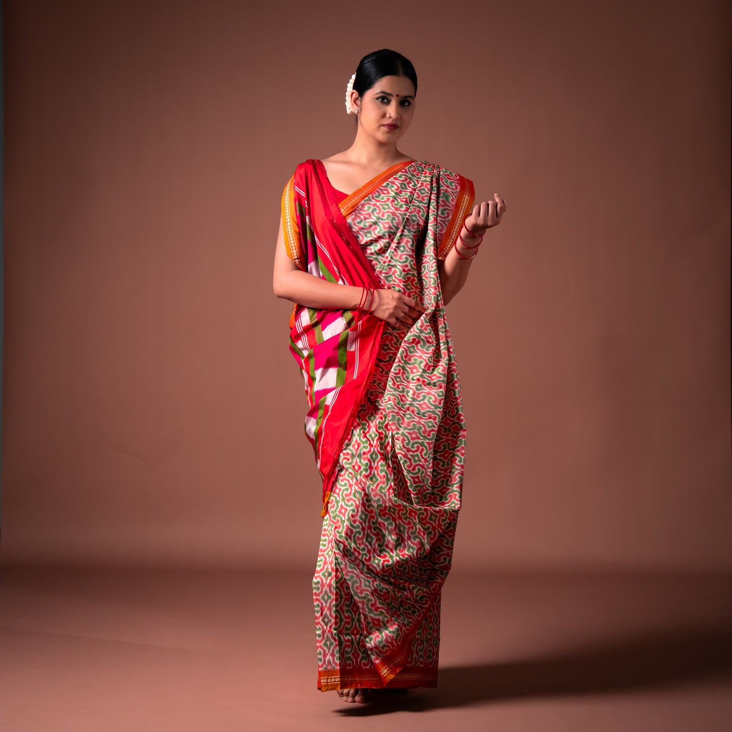 Bibhu Mohapatra Orange & Green Mulberry Silk Pochampally Ikat Saree Ikatan
