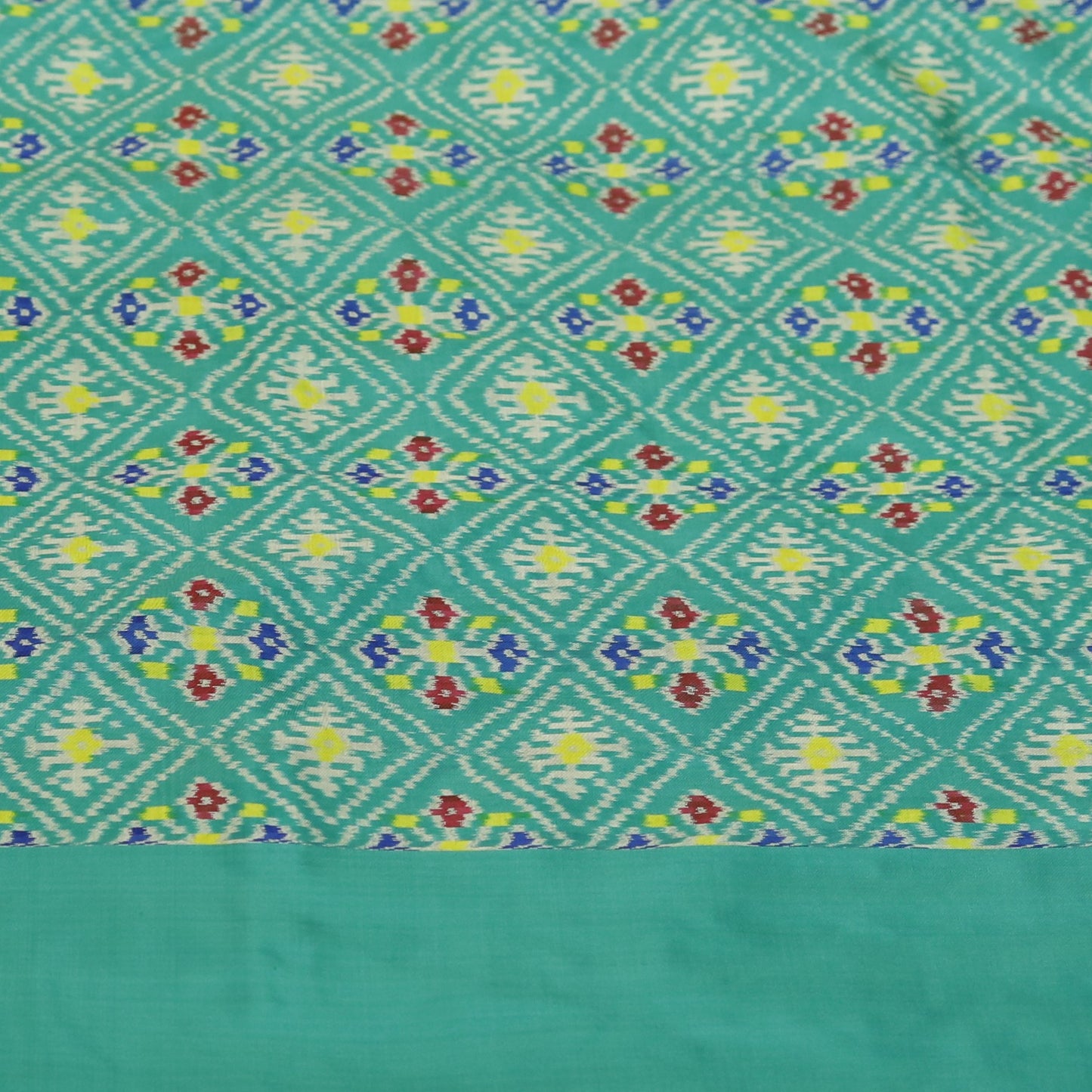 Cream & Turqouis  Mulberry Silk Pochampally Ikat Saree