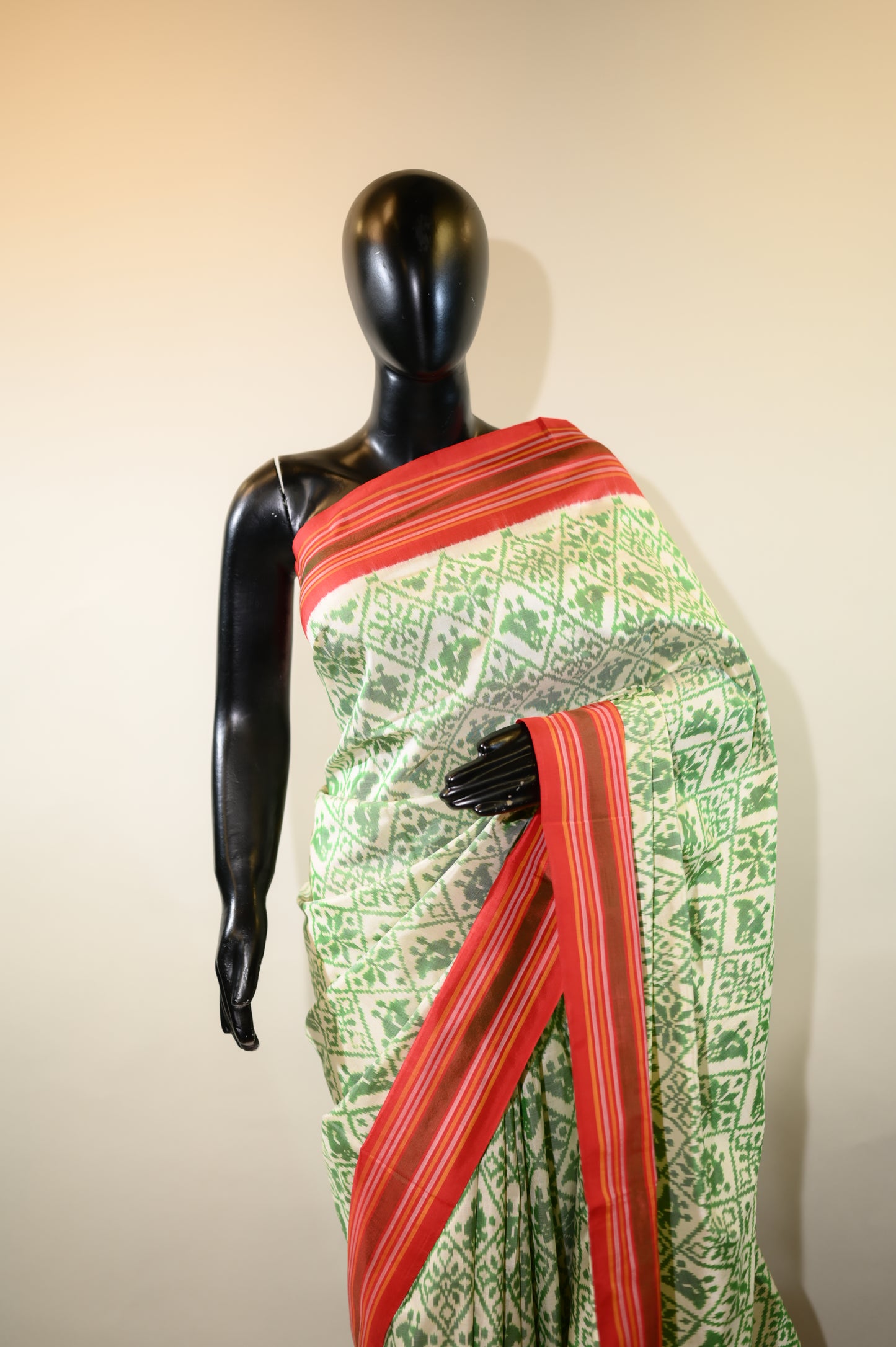 Cream-Green & Red Mulberry Silk Patola Ikat Saree